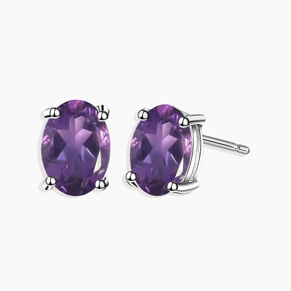 Front view of Elegant Amethyst Oval Stud Earrings in Sterling Silver, showcasing stunning oval-cut amethyst stones, exuding timeless charm and elegance.