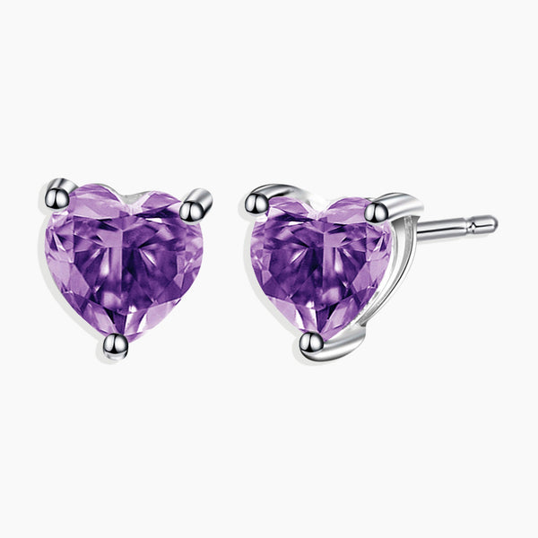 Front view of Timeless Amethyst Heart Shape Stud Earrings in Sterling Silver, showcasing heart-shaped studs adorned with captivating amethyst stones.