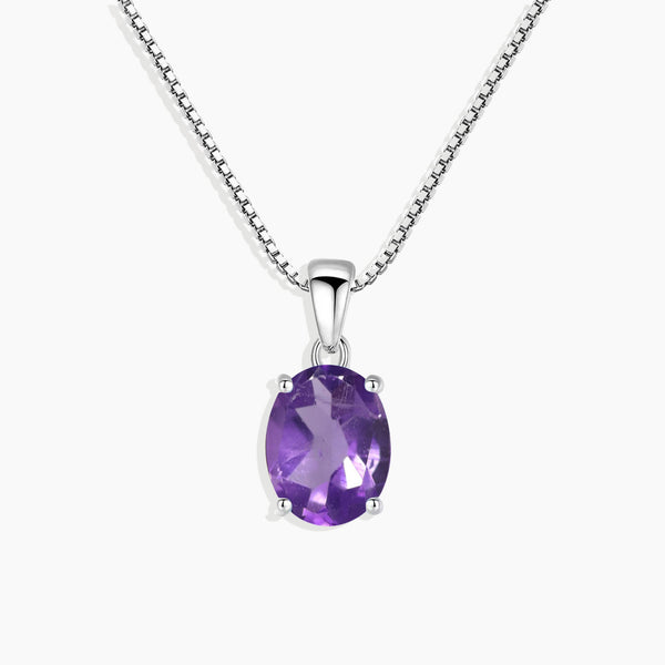 Front view of the Exquisite Irosk Oval Cut Amethyst Pendant, showcasing the sterling silver pendant adorned with a stunning oval-cut amethyst gemstone.