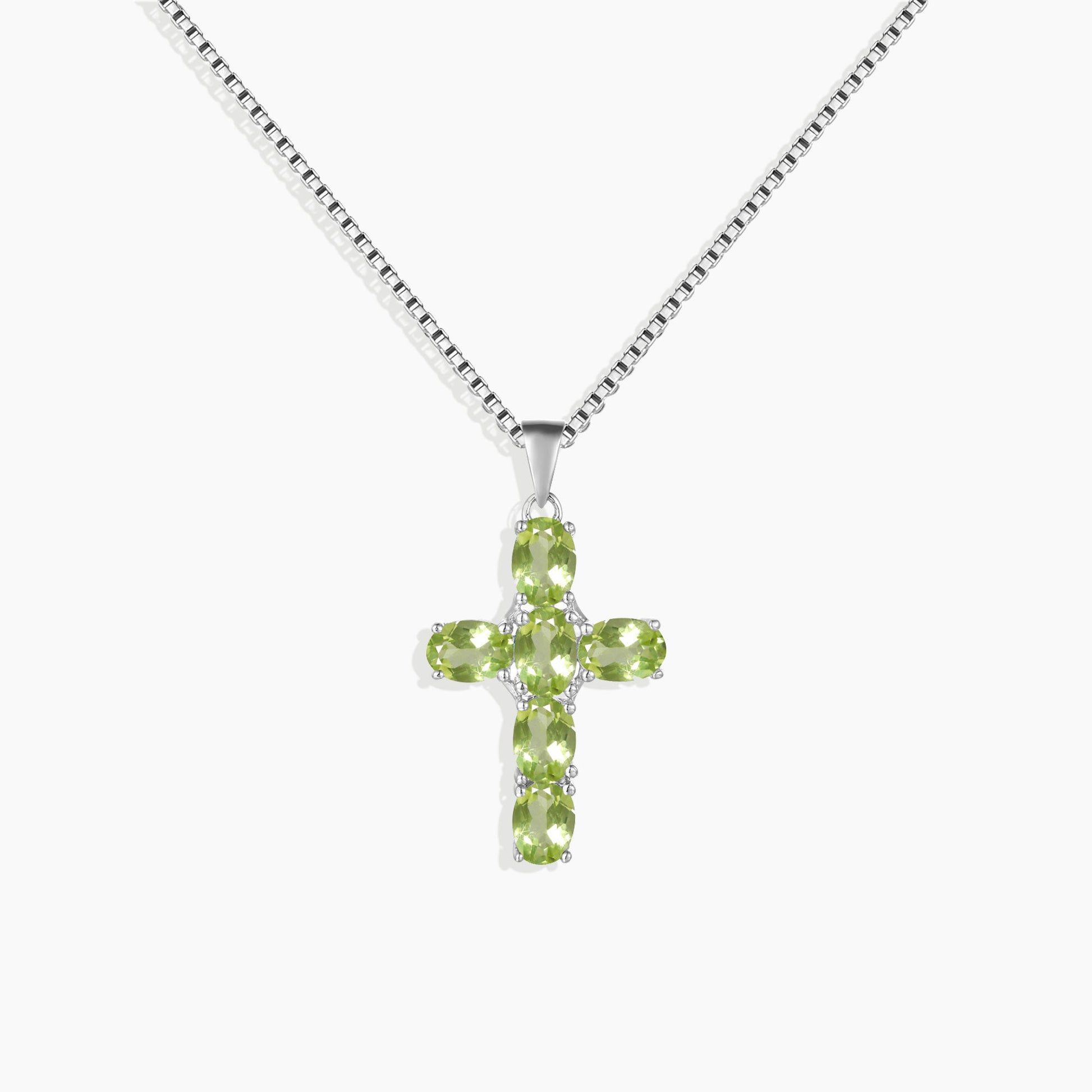 front side photo of peridot cross pendant for ecommerce