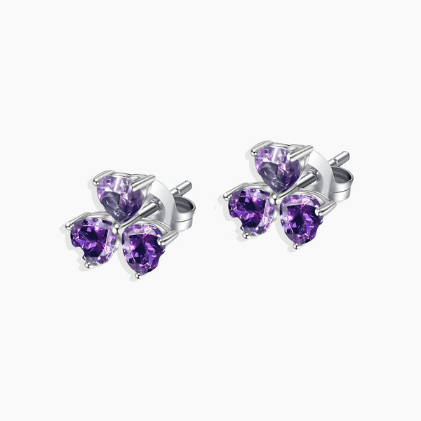 Front view of Charming Flower Shape Stud Earrings in Sterling Silver, showcasing delightful flower shapes adorned with mesmerizing amethyst stones.