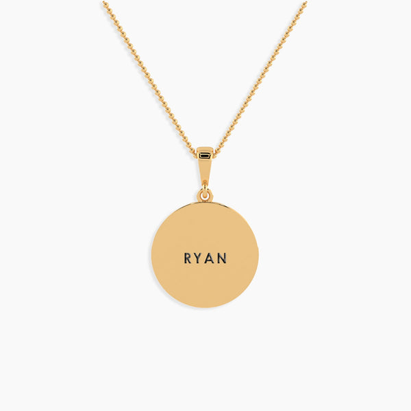 Front view of the Classic Round Pendant: Amore Token,with ryan engraved on it