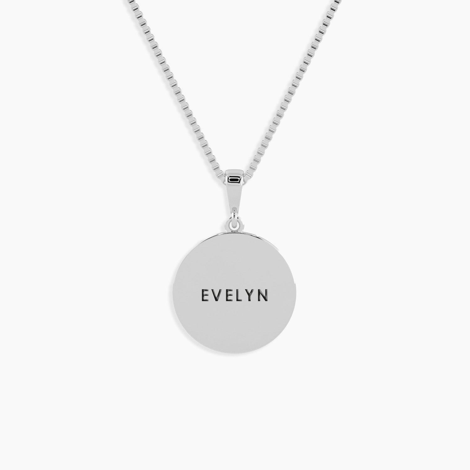 silver pendant with evelyn engraved on one side